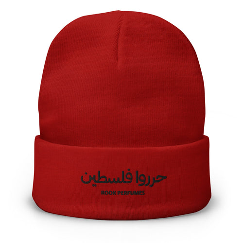Embroidered Free Palestine beanie by Rook Perfumes London, featuring bold lettering on a cozy knit design.
