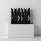 Rook Perfumes Discovery Set Sampler featuring various fragrance vials and a 15% voucher in a stylish display.